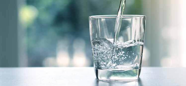 close-pouring-purified-fresh-drink