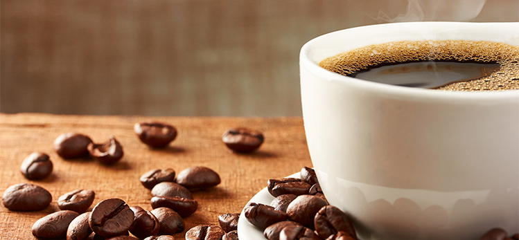 coffee-cup-beans-on-table